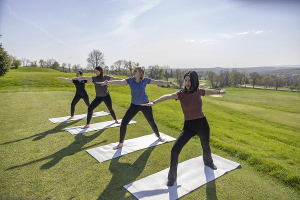 Four women doing yoga at Crystal Springs Resort