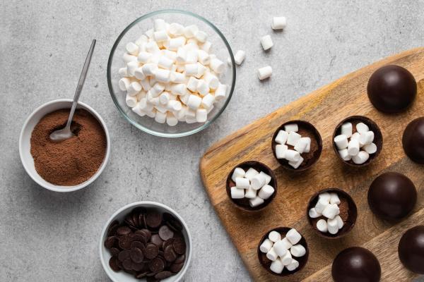 Ingredients to create a hot cocoa bomb.