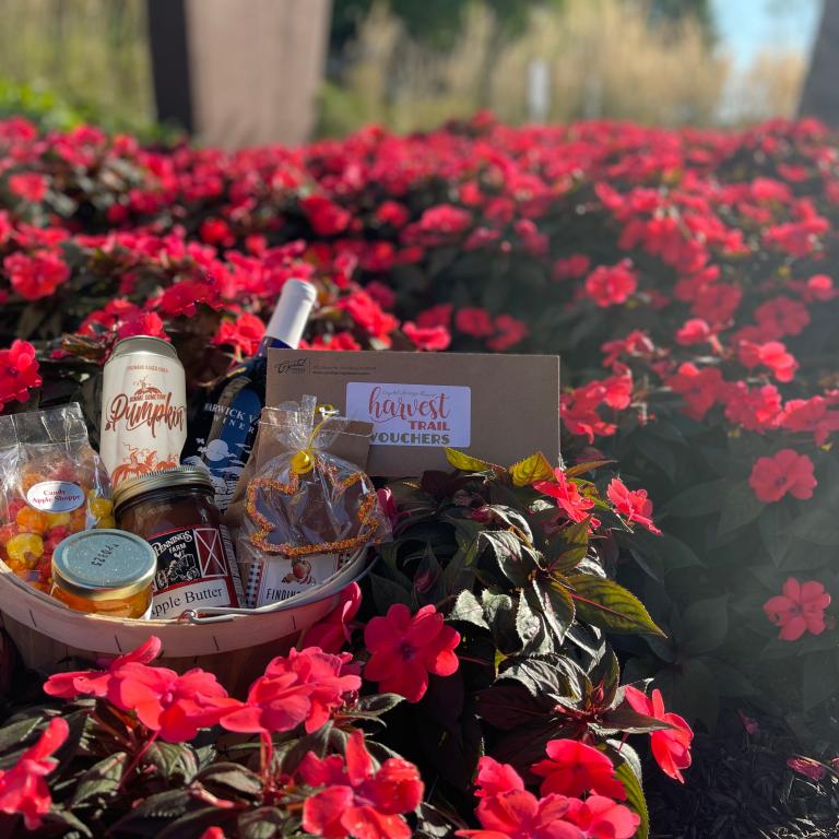 Havest trail basket featuring wine, local honey, pumpkin butter, kettle corn and more. 