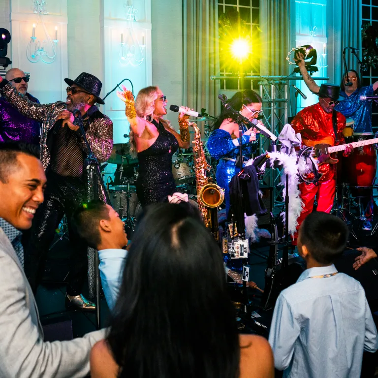 Family dancing in Emerald Ballroom on NYE