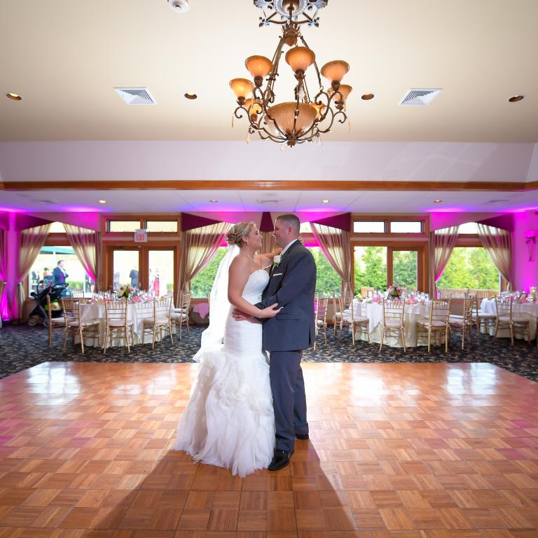 Wedding couple dancing on dance floor at Black Bear Golf Club