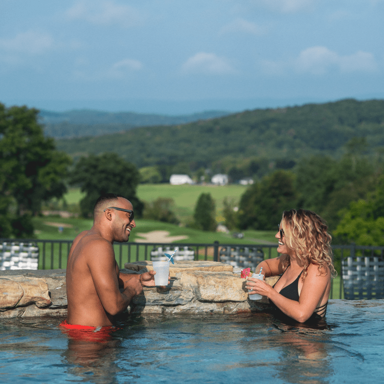 Couple in Vista 180 pool.