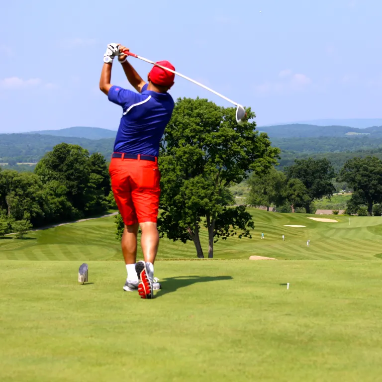 Golfer playing at a course at Crystal Springs Resort