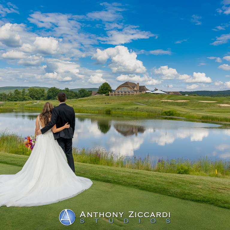 Wedding couple overlooking the golf course at Ballyowen