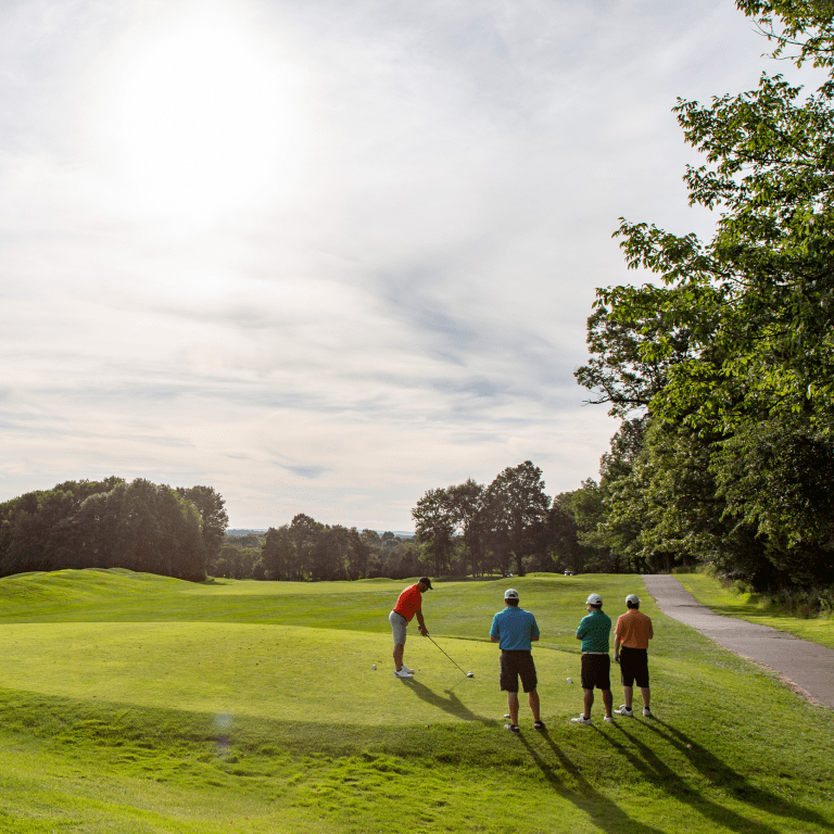 Four golfers on Black Bear golf course.