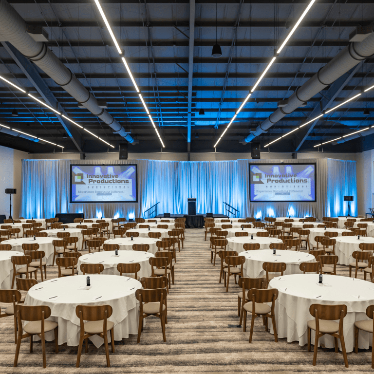 Canyon Ballroom at Minerals Hotel set up with round tables.