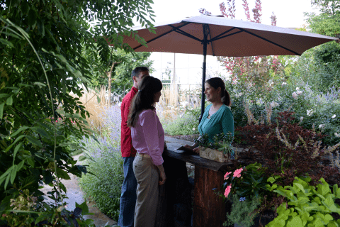 Hostess seating guests at Chef's Garden