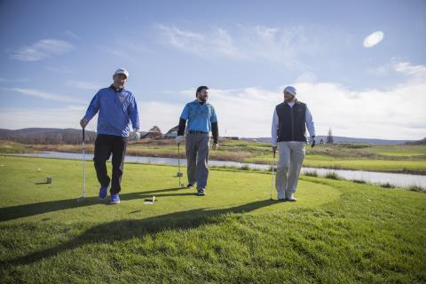 Golfers playing golf in fall at Crystal Springs Resort