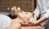 Blonde haired woman laying on spa table.