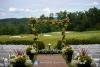 Beautiful flower arbor wedding ceremony set up at Ballyowen golf course