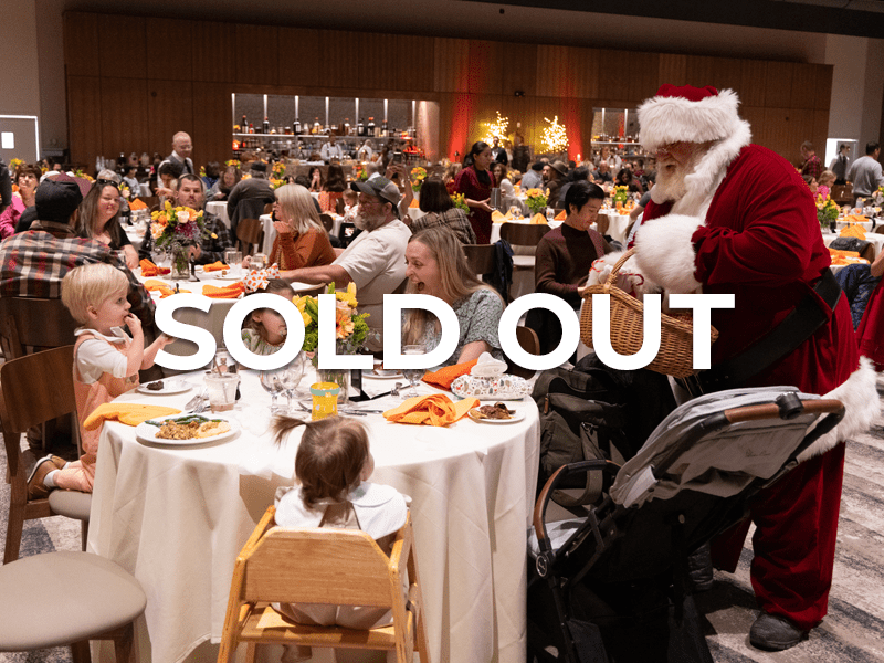 Family dining in Canyon Ballroom while being greeted by Santa. 