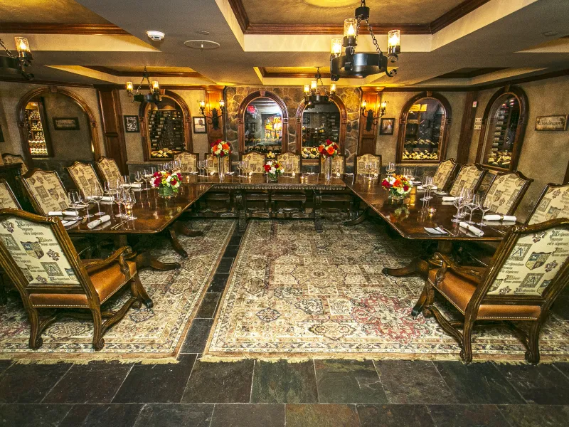 Wine cellar dining room setup. 