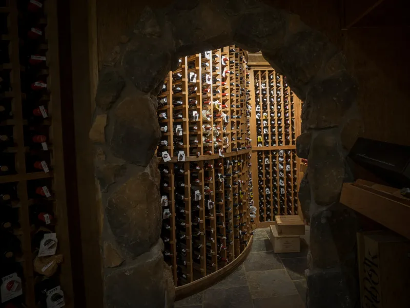 Wine being stored in the walls of the wine cellar. 