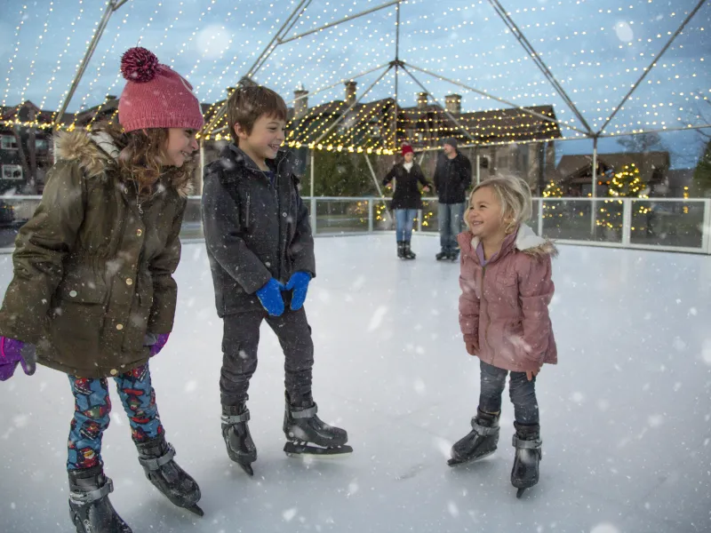 Children Glice Skating Together during family vacation in NJ