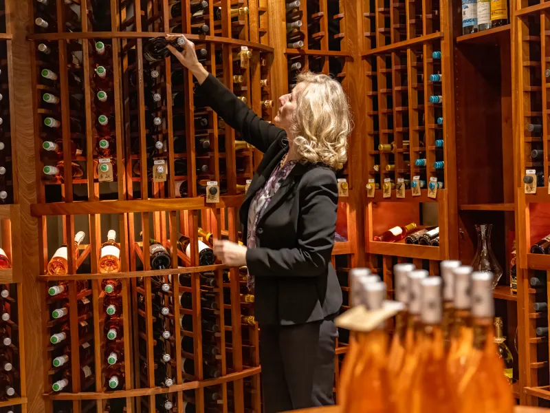 Sommelier picking wine at The Curator at Crystal Springs Resort in NJ