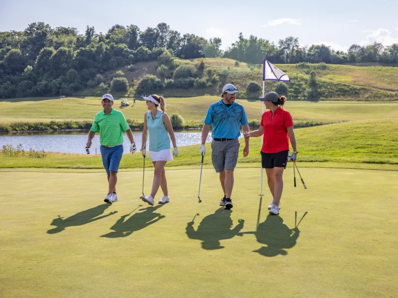 A foursome on the course of Wild Turkey at Crystal Springs Resort