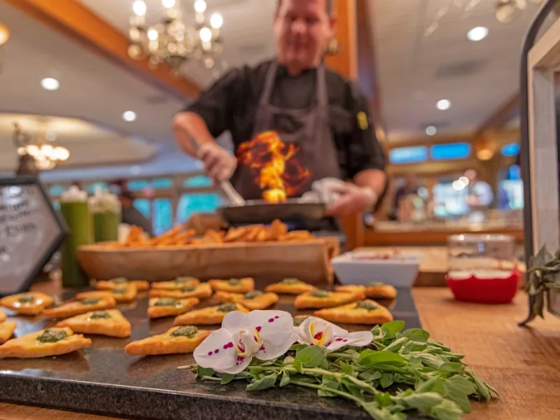 Chef cooking fresh food at catered event