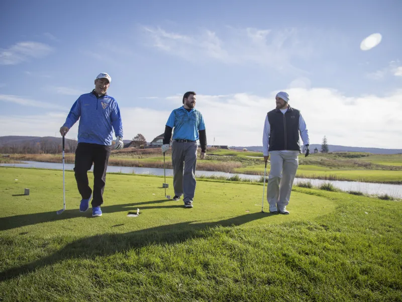 Golfers playing golf in fall at Crystal Springs Resort