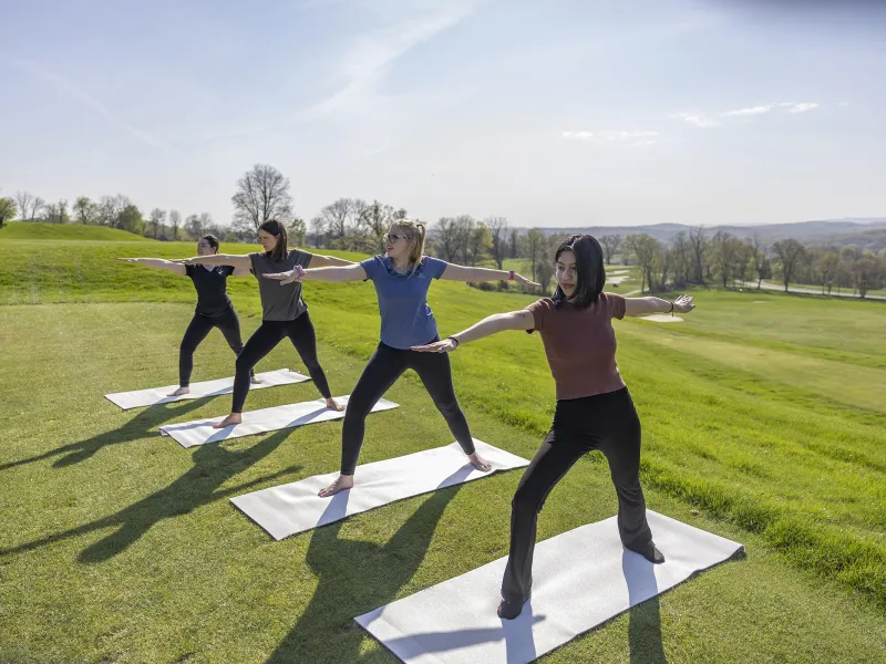 Four women doing yoga at Crystal Springs Resort